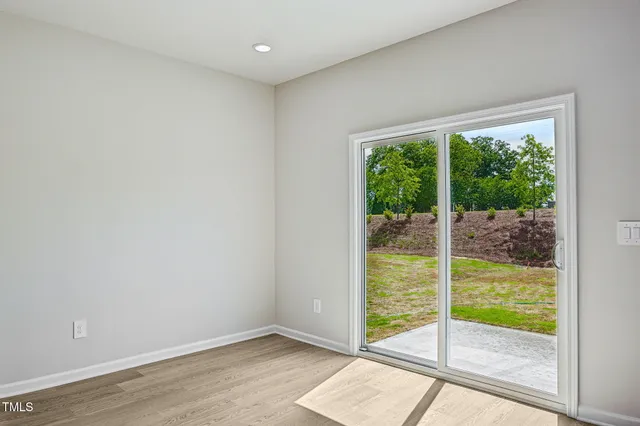 a view of a room that has a window