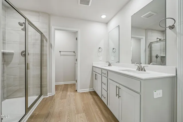 a view of an empty room and a window