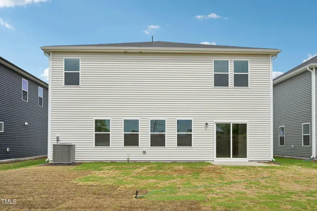 a front view of house with yard