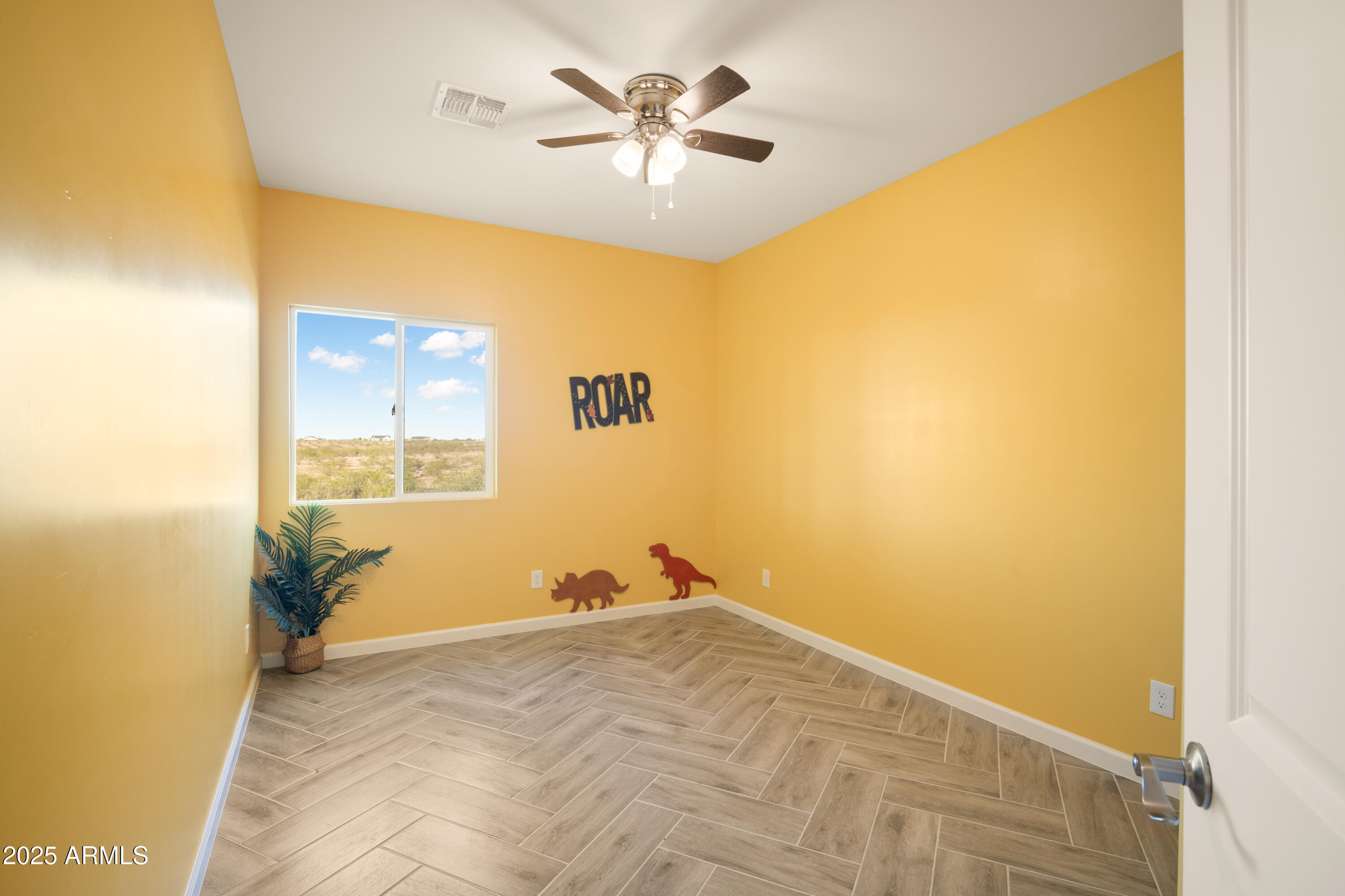 35684 West Chipman Road Tonopah, AZ 85354 - Photo 13 of 39 a view of a big room with windows
