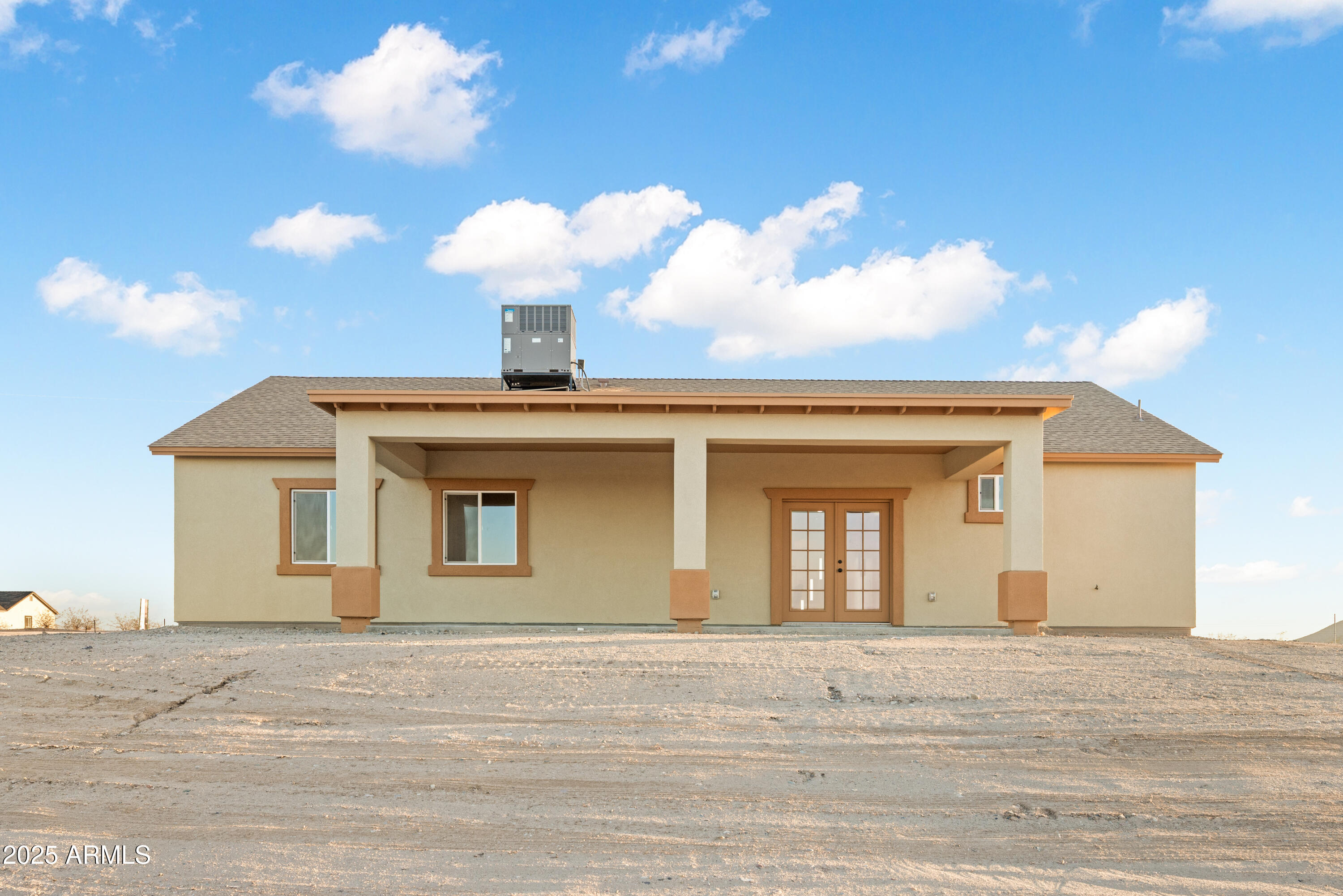 35684 West Chipman Road Tonopah, AZ 85354 - Photo 33 of 39 a view of a house with a chandelier