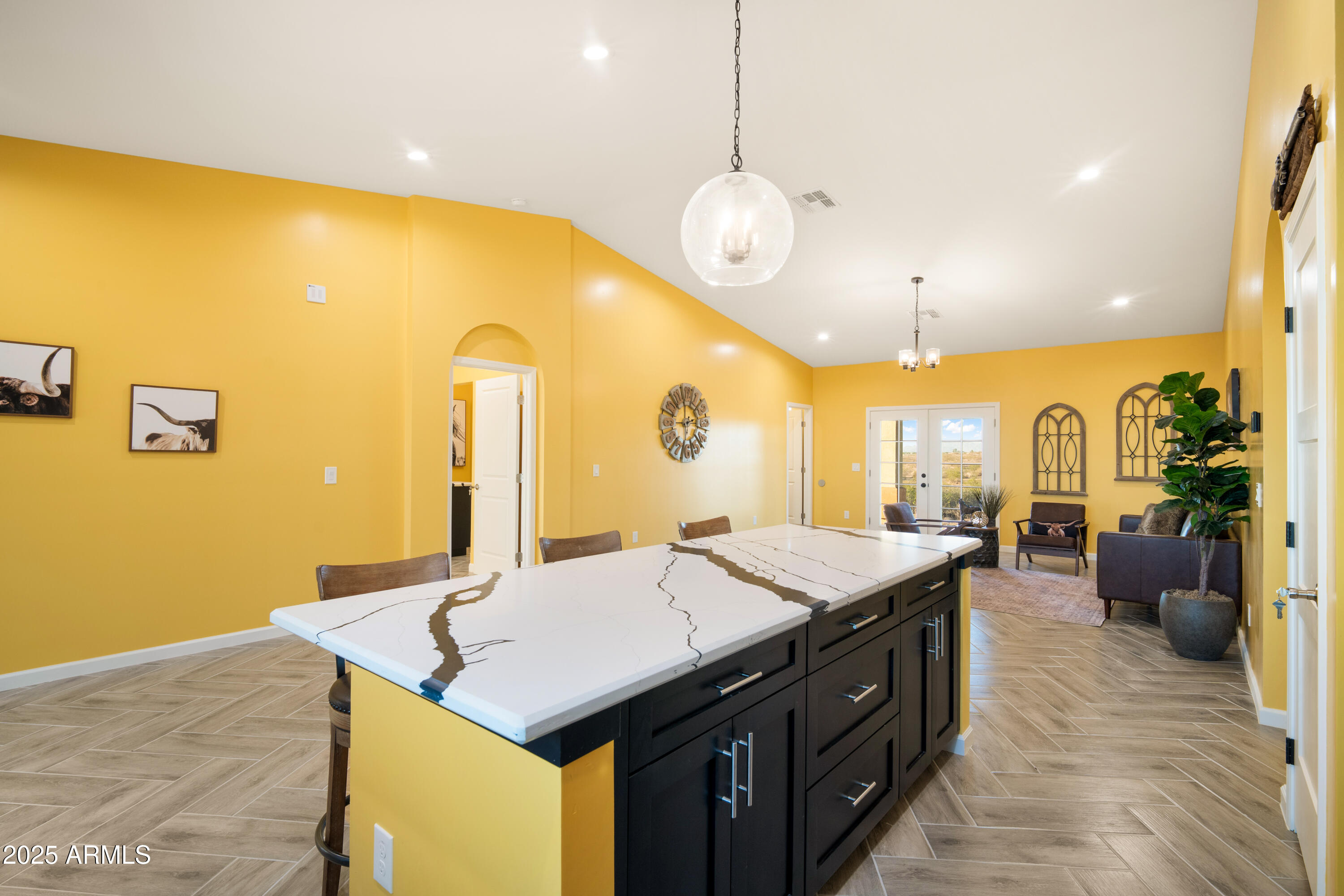 35684 West Chipman Road Tonopah, AZ 85354 - Photo 7 of 39 a large kitchen with a table and chairs
