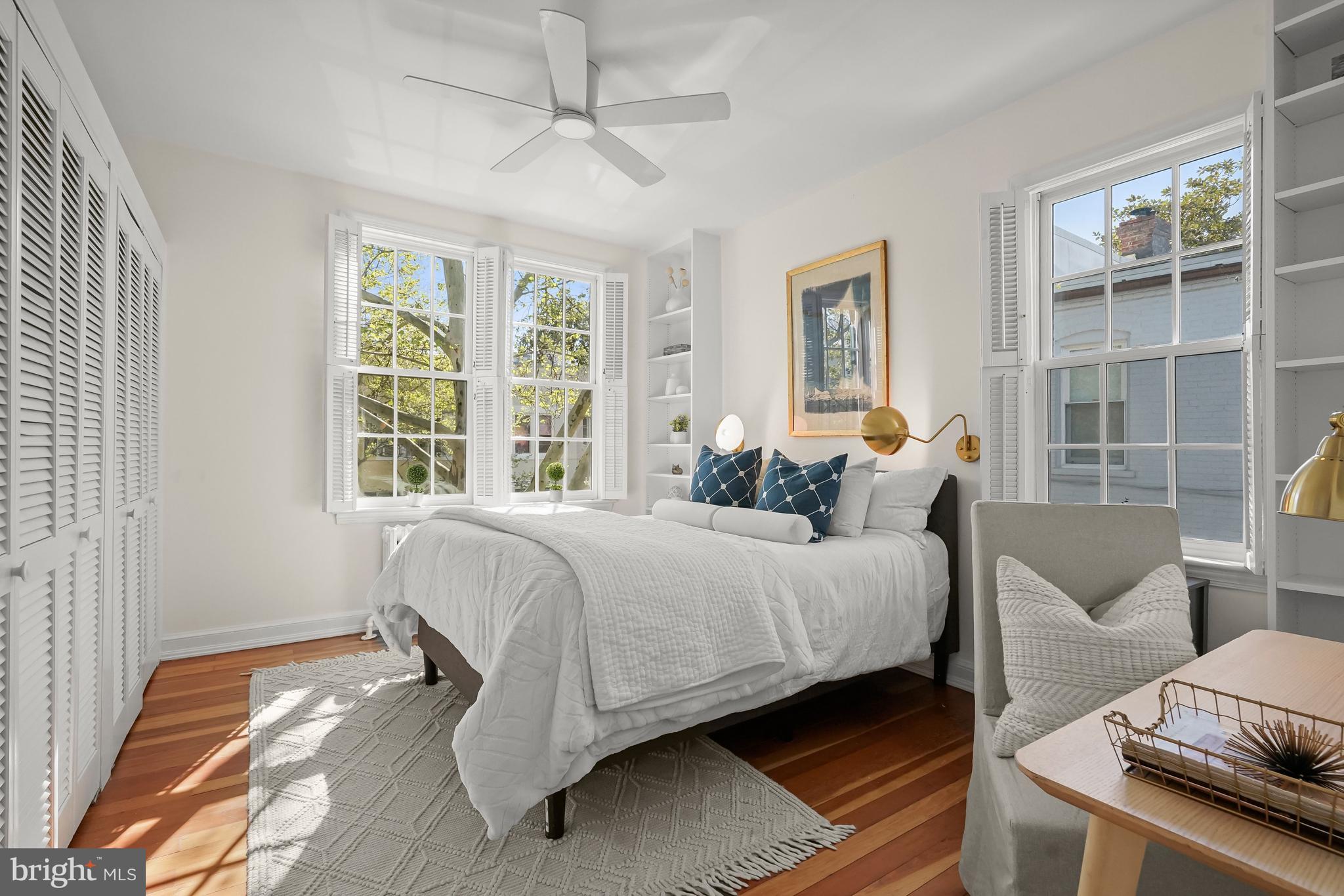 1654 34th Street Northwest Washington, DC 20007 - Photo 14 of 18 Bright primary bedroom with large windows