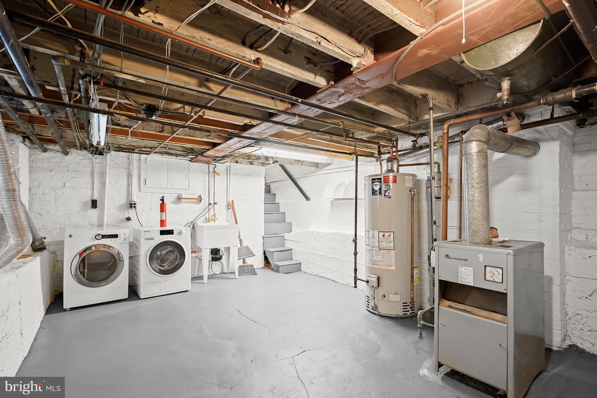 1654 34th Street Northwest Washington, DC 20007 - Photo 17 of 18 Basement with utilities, laundry, storage