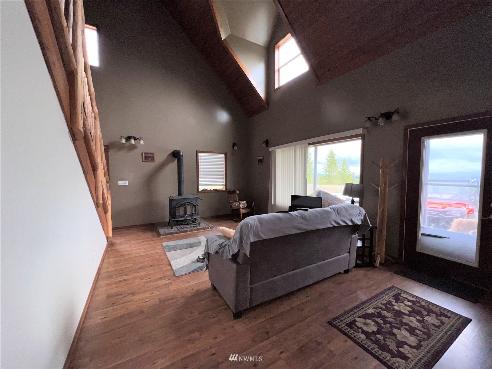 144 Roy Road Republic, WA 99166 - Photo 3 of 28 a living room with furniture and a rug