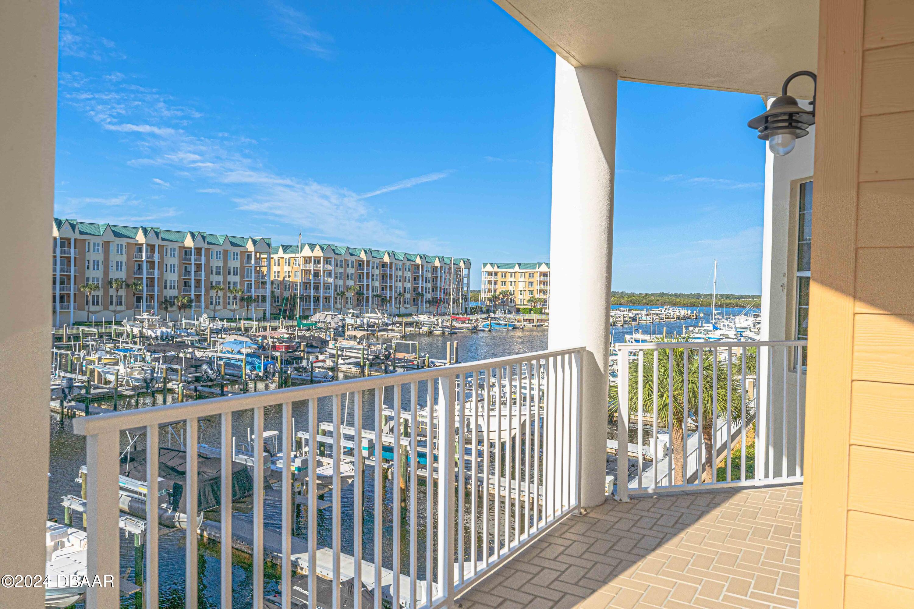 4625 Rivers Edge Village Lane, Unit 5301 Ponce Inlet, FL 32127 - Photo 14 of 50 SOUTH PATIO VIEW TO RIVER