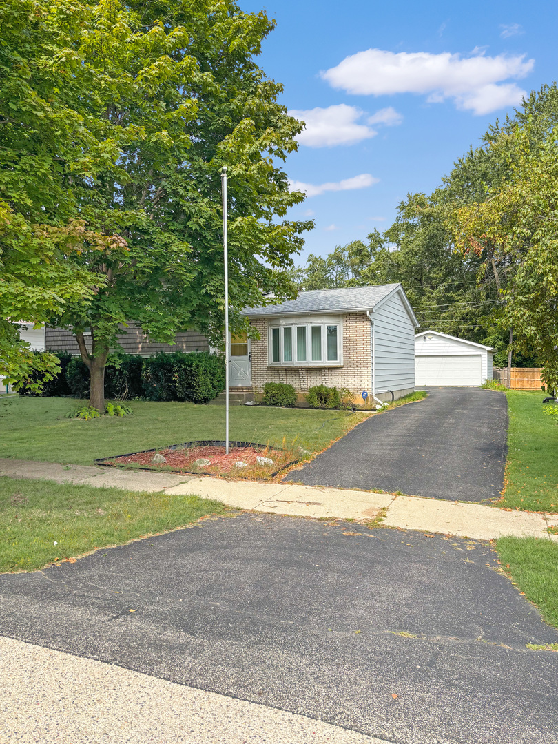 1008 18th Street Zion, IL 60099 - Photo 1 of 19 a view of a house with a swimming pool