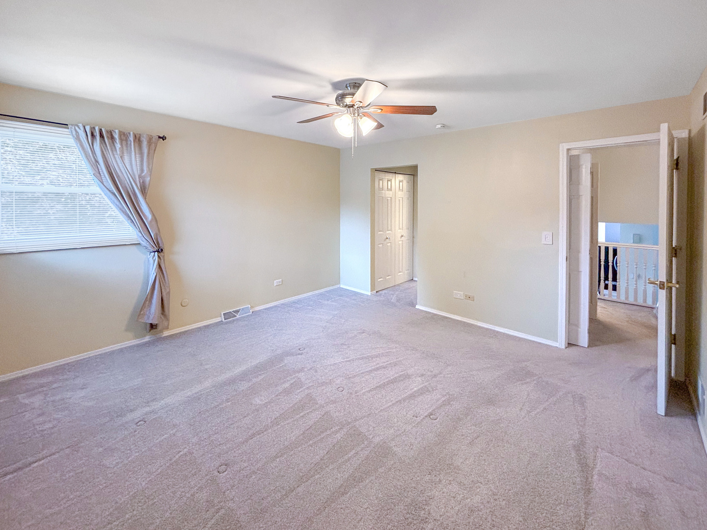 1008 18th Street Zion, IL 60099 - Photo 7 of 19 a view of an empty room with a window