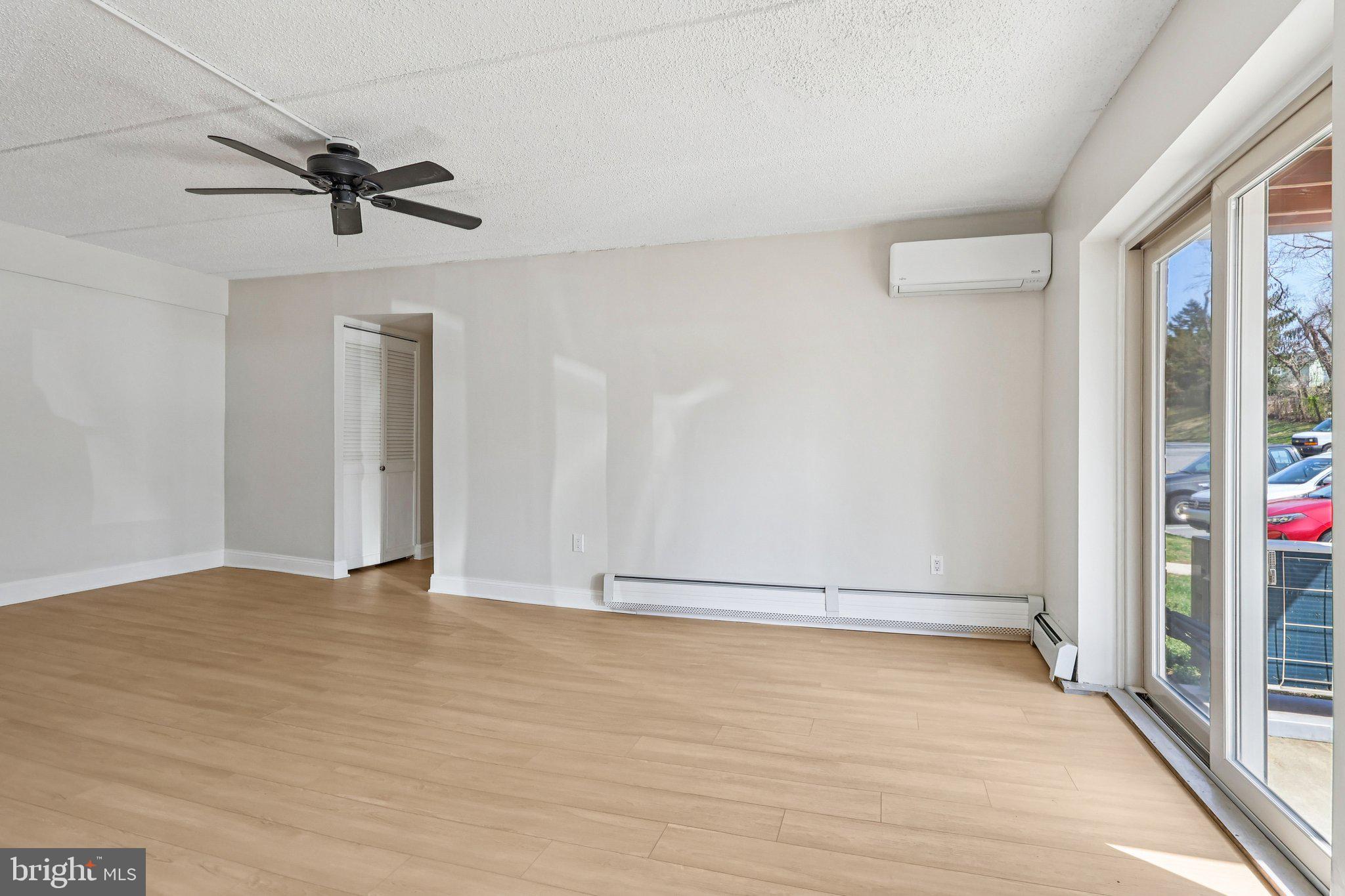 280 Bridgewater Road, Unit F8 Brookhaven, PA 19015 - Photo 3 of 16 Large living area with mini split air conditioning