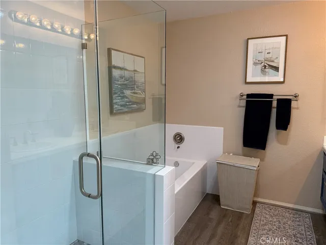 a bathroom with a bathtub sink and toilet