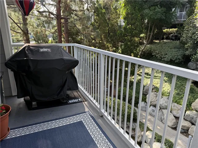 a view of balcony with a potted plant