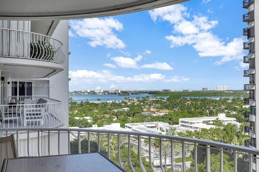 10155 Collins Avenue, Unit 1106 Bal Harbour, FL 33154 - Photo 5 of 29 a view of a city from a balcony