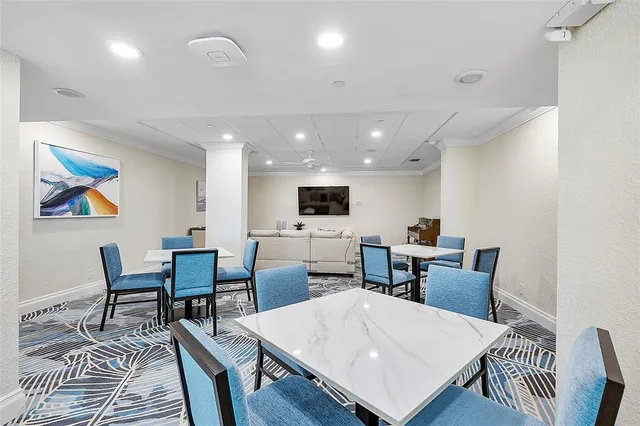 a view of a dining room with furniture