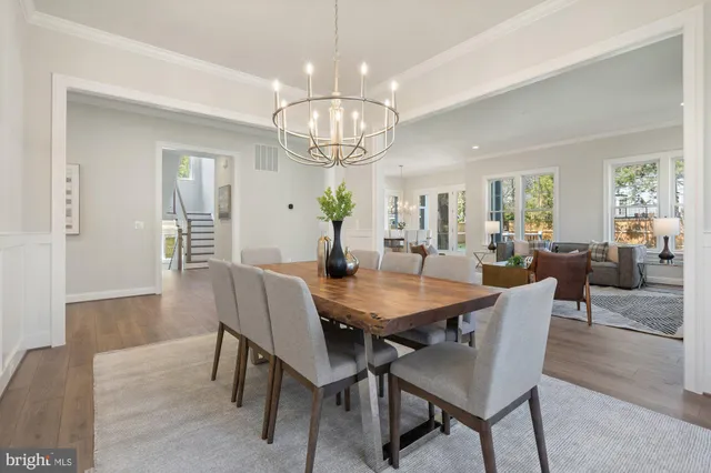 a kitchen with a sink a stove and cabinets