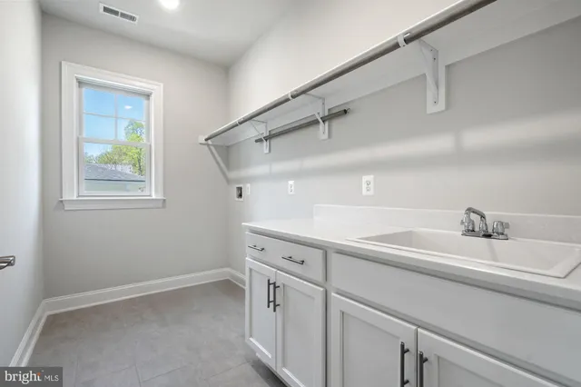 a view of a room with racks on the wall