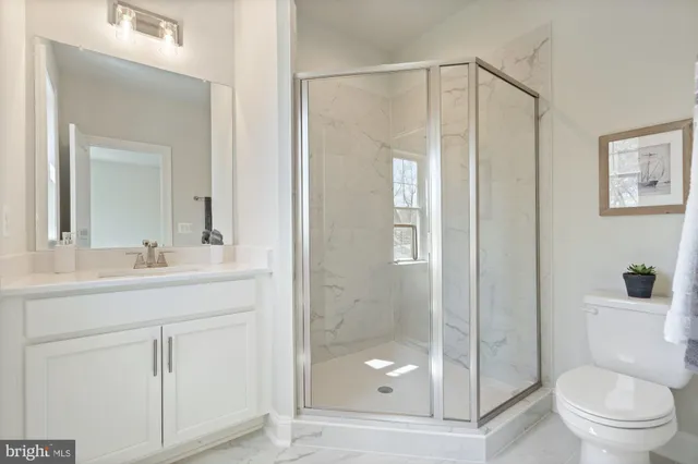 a front view of a house with a yard table and chairs