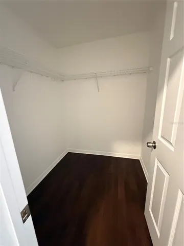 a bathroom with a sink vanity and mirror