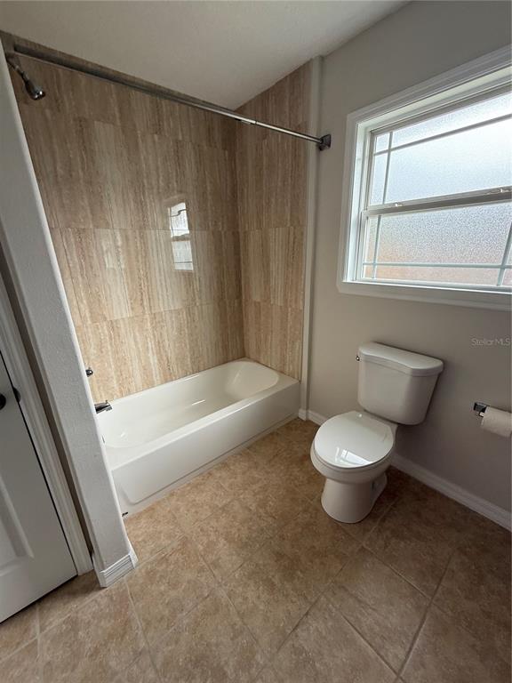 237 Northeast Gum Swamp Road Lake City, FL 32055 - Photo 25 of 34 a bathroom with a toilet and a shower