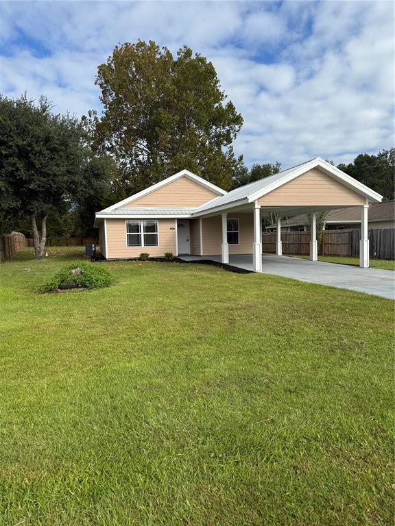 237 Northeast Gum Swamp Road Lake City, FL 32055 - Photo 3 of 34 a view of a house with a yard and sitting area
