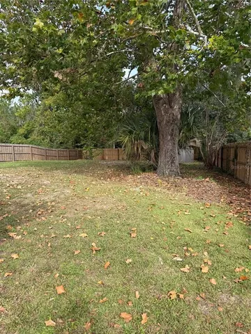 a view of backyard with green space