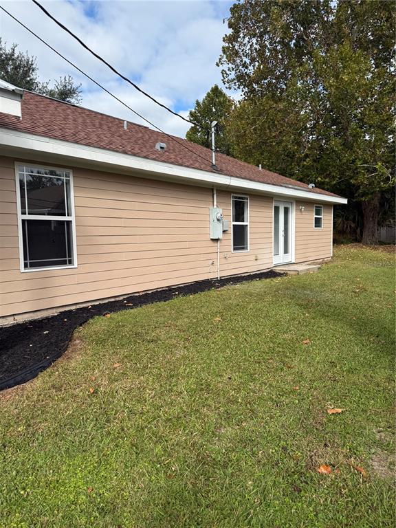 237 Northeast Gum Swamp Road Lake City, FL 32055 - Photo 7 of 34 a backyard of a house with lots of green space