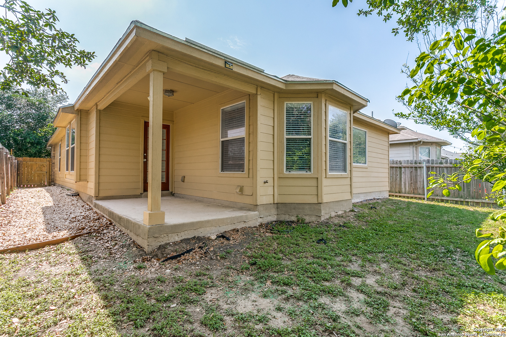 3603 Aranda Fields Converse, TX 78109 - Photo 11 of 13 a view of a house with backyard and garden