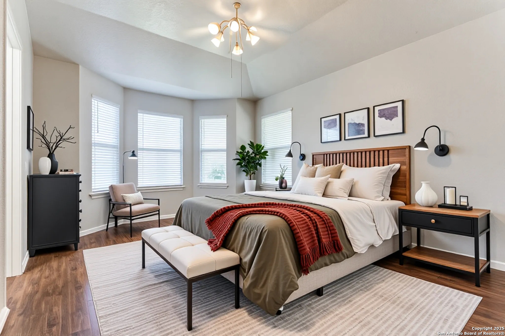 3603 Aranda Fields Converse, TX 78109 - Photo 5 of 13 a spacious bedroom with a bed and wooden floor