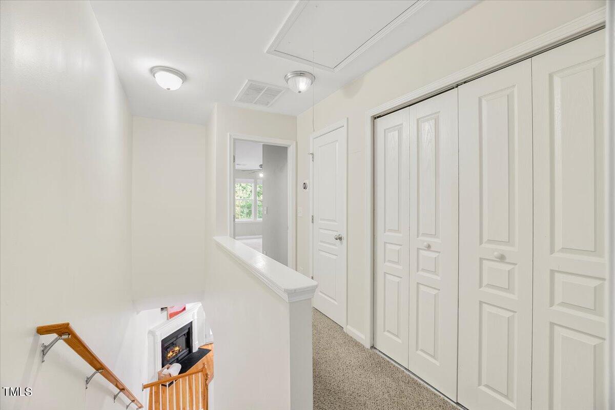 4508 Sugarbend Way Raleigh, NC 27606 - Photo 22 of 39 a view of a hallway with entryway door