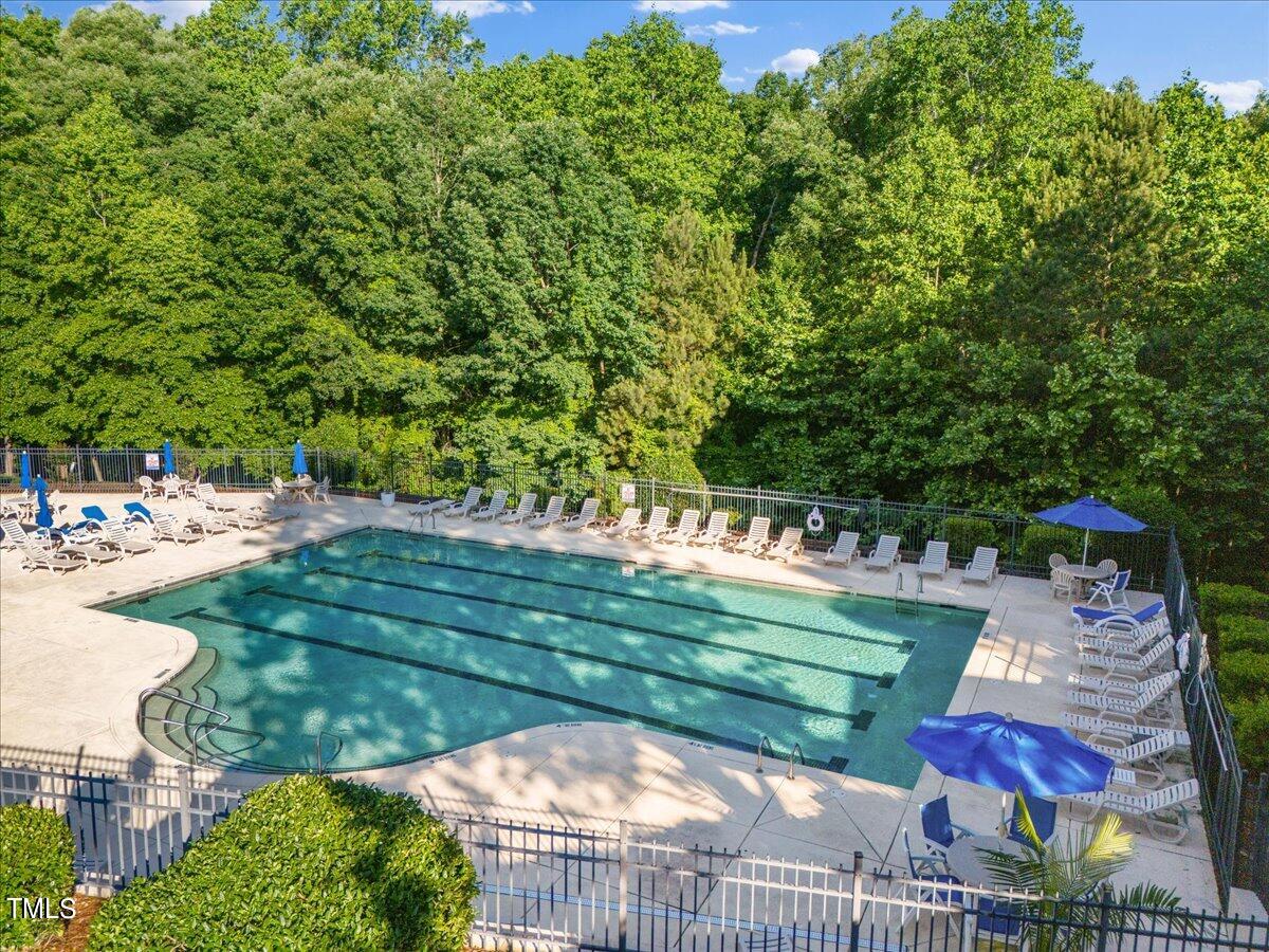 4508 Sugarbend Way Raleigh, NC 27606 - Photo 37 of 39 a view of backyard with swimming pool