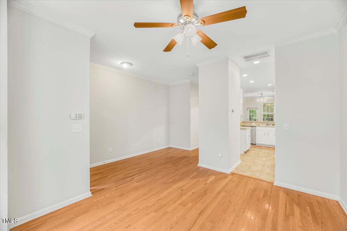 4508 Sugarbend Way Raleigh, NC 27606 - Photo 6 of 39 a view of empty room with wooden floor