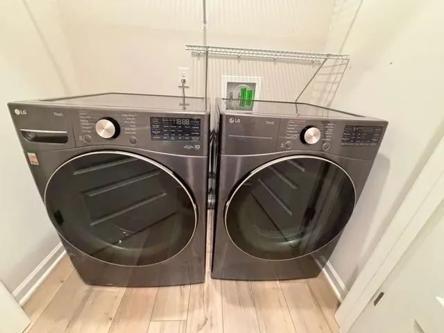 a utility room with dryer and washer