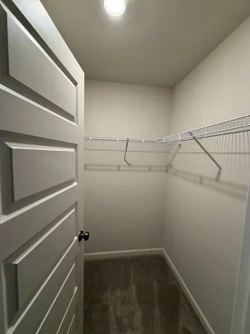 a view of a door and a window