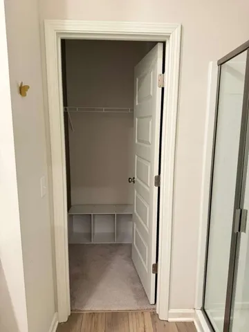 a bathroom with a double vanity sink and mirror