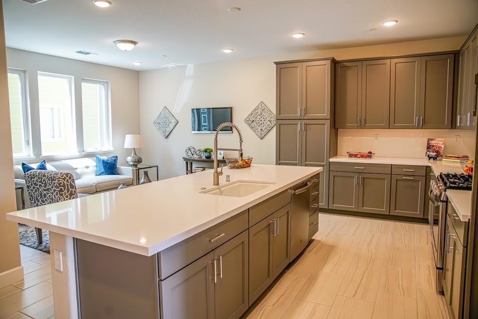 81 South Milpitas Boulevard Milpitas, CA 95035 - Photo 14 of 40 a kitchen with kitchen island a sink appliances and cabinets