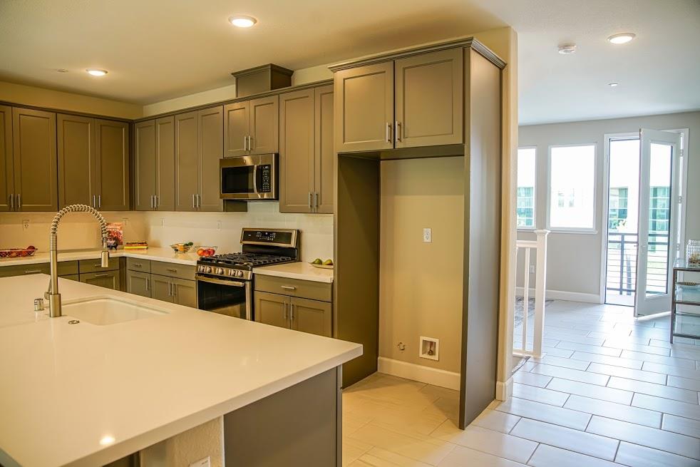 81 South Milpitas Boulevard Milpitas, CA 95035 - Photo 16 of 40 a kitchen with stainless steel appliances a refrigerator and a stove top oven