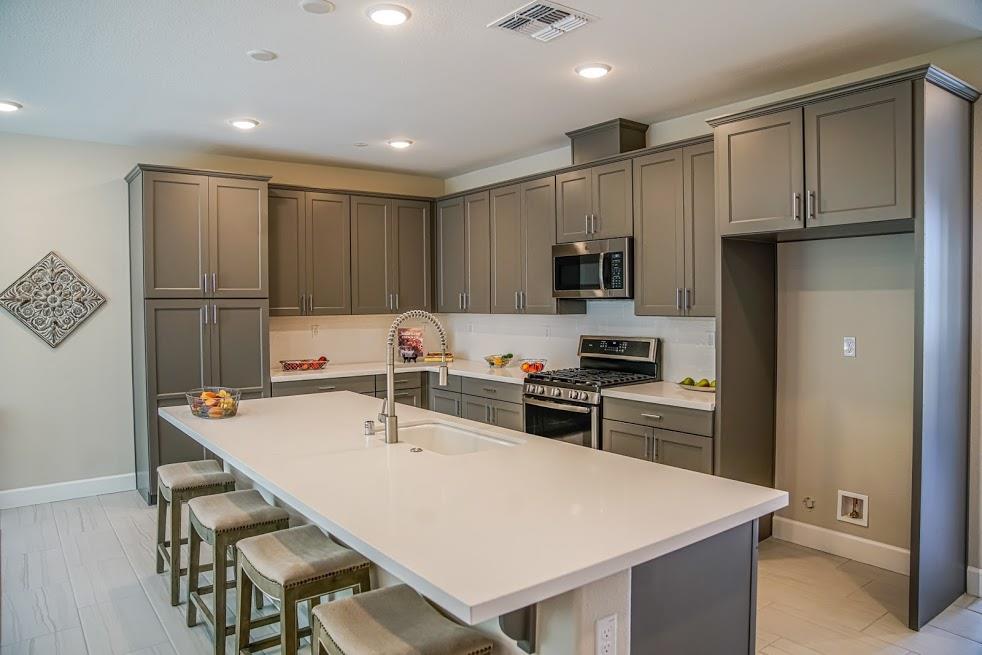 81 South Milpitas Boulevard Milpitas, CA 95035 - Photo 17 of 40 a kitchen with kitchen island a sink stove and refrigerator