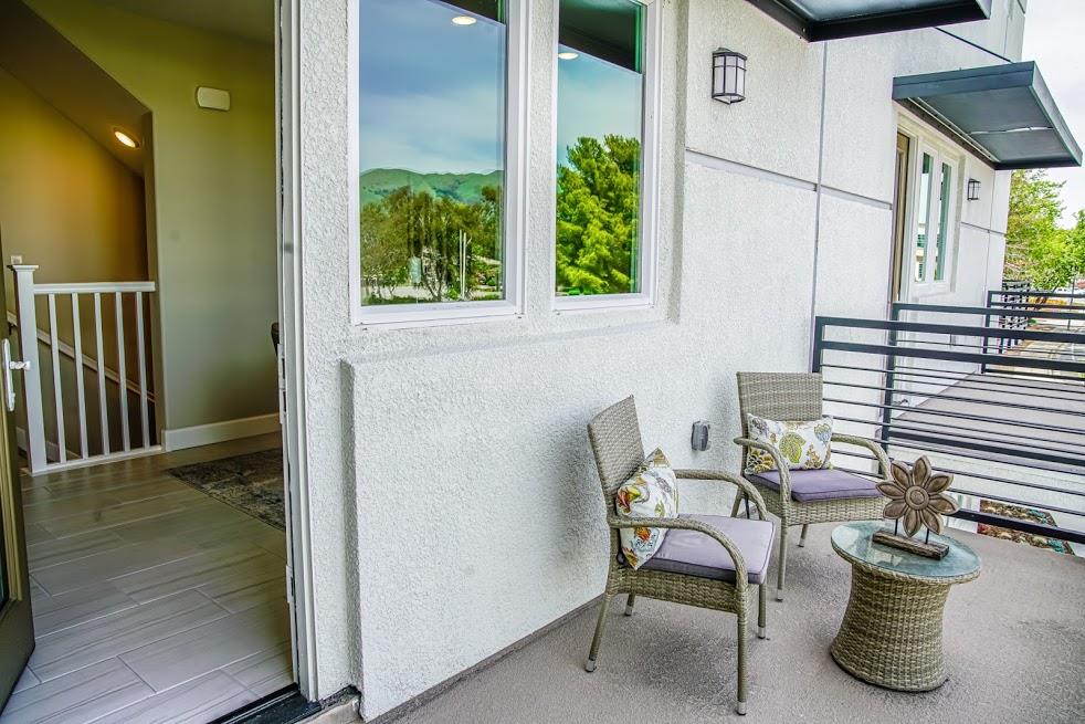 81 South Milpitas Boulevard Milpitas, CA 95035 - Photo 25 of 40 a balcony with chairs and a potted plant