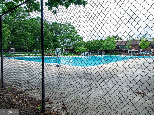 a view of a yard and a fence