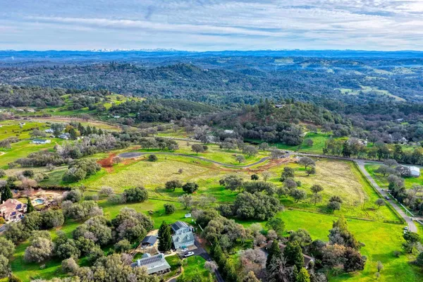 a view of a yard with an outdoor space