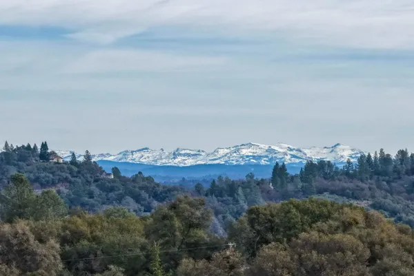 a view of lake and mountain