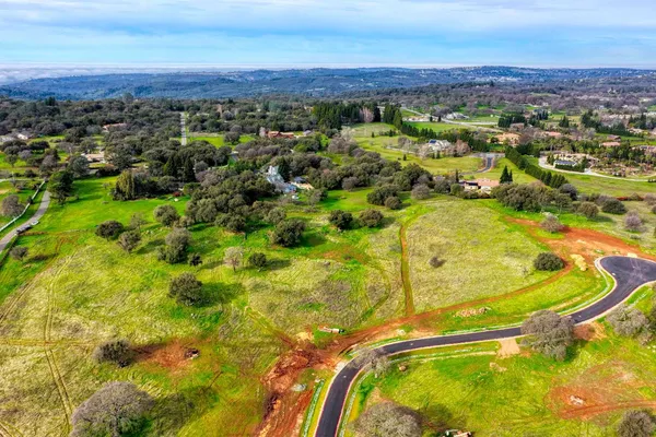 a view of a swimming pool with an ocean view