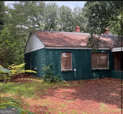 a backyard of a house with lots of green space