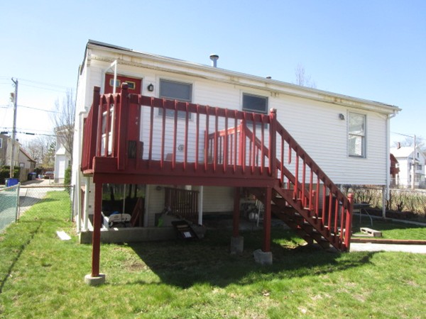 54 Daniel Avenue Providence, RI 02909 - Photo 2 of 2 a view of a house with a yard