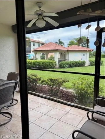 a workspace with furniture and window