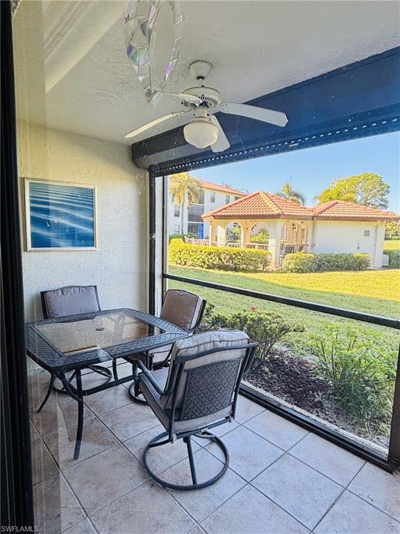 605 Augusta Boulevard, Unit 4 Naples, FL 34113 - Photo 19 of 25 a workspace with furniture and window