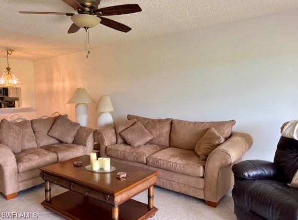 605 Augusta Boulevard, Unit 4 Naples, FL 34113 - Photo 2 of 25 a living room with furniture
