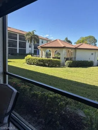a front view of a building with street view