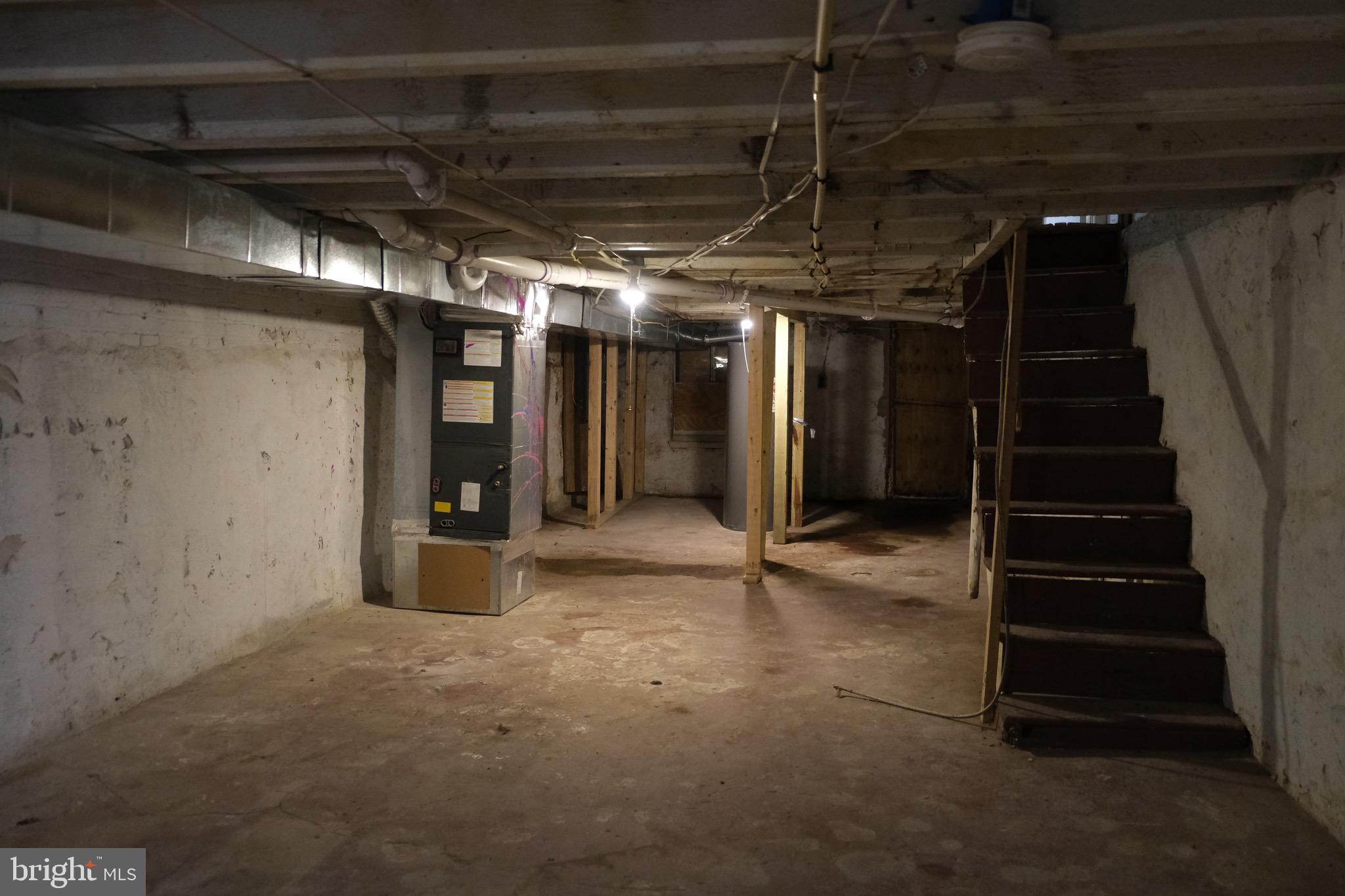 3316 West Belvedere Avenue Baltimore, MD 21215 - Photo 19 of 19 a view of an empty room with stairs