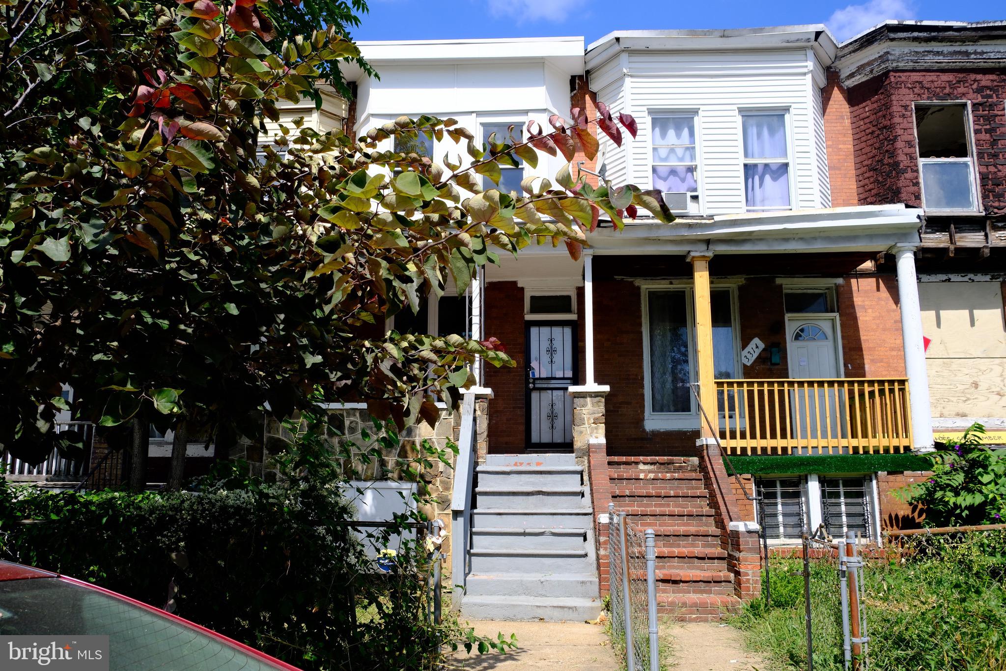 3316 West Belvedere Avenue Baltimore, MD 21215 - Photo 2 of 19 a front view of a house