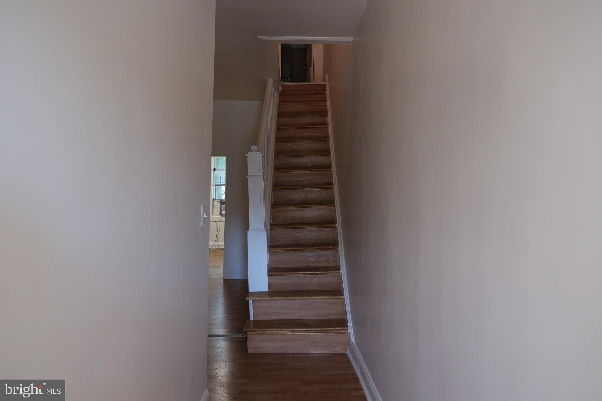 3316 West Belvedere Avenue Baltimore, MD 21215 - Photo 7 of 19 a view of hallway with stairs